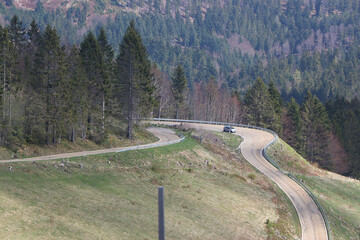 Sweeping views over the tree lined and occasionally snowy valleys and hills of the Black forest around Badenweiler in southern Germany near the border with Switzerland at the heart of Europe