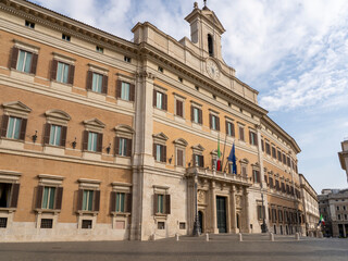 Fototapeta na wymiar Roma, Italy. View of the facade of the Palazzo Montecitorio seat of the Chamber of Deputies of the Italian Parliament