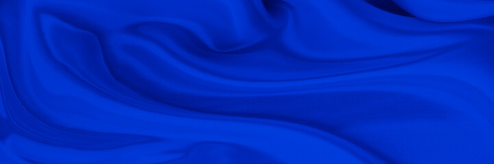 Obraz premium Black blue satin dark fabric texture luxurious shiny that is abstract silk cloth background with patterns soft waves blur beautiful.