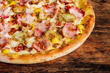 pizza with ham and pickles