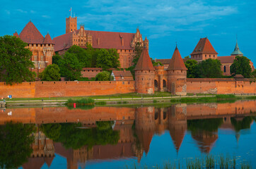 Naklejka na ściany i meble Castle of the Teutonic Knights Order in Malbork, Poland, is the largest castle in the world. Malbork Poland.