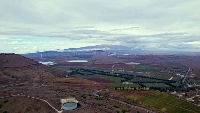 Drone shot of mount Hermon and wind turbines in the golan heights Israel