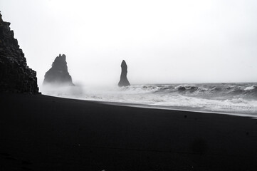 Naklejka na ściany i meble Majestic place of the stormy Atlantic ocean. Basalt rocks 