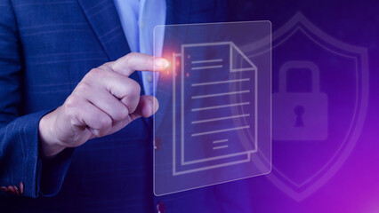 Document Management System (DMS) being setup IT consultant working on laptop computer in office. Software for archiving, searching and managing corporate files information