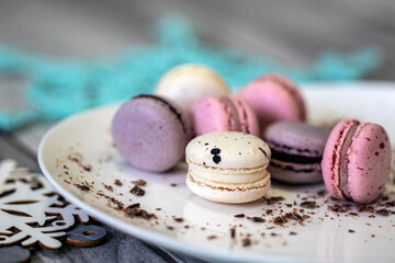 Multi-colored cakes and winter mood among snowflakes.