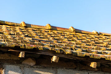 The roof of an old house in the village