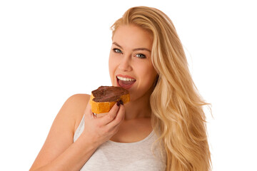 Young blond woman eating breakfast bread and nougat spread isolated over white background - 556671851