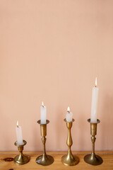 Four candles lighted in candlestick