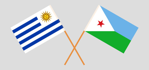 Fototapeta premium Crossed flags of Uruguay and Djibouti. Official colors. Correct proportion