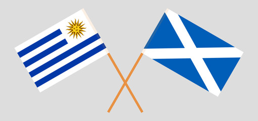 Crossed flags of Uruguay and Scotland. Official colors. Correct proportion