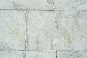 Background with a wall of large granite blocks. Slabs with stone texture.
