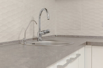 kitchen chrome faucet in high tech style