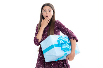 Teenager kid with present box. Teen child girl giving birthday gift. Present, greeting and gifting concept.