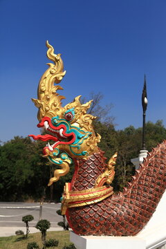 Naga head at the staircase in the Temple