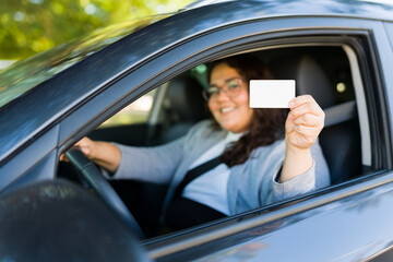 Cheerful woman getting her driver's license