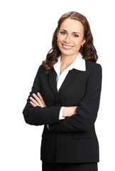 Portrait image of happy smiling young business woman standing in crossed arms pose, black confident suit, isolated on white background. Female executive office worker, teacher or real estate agent.