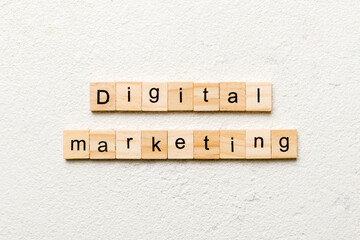 Digital Marketing word written on wood block. Digital Marketing text on cement table for your desing, concept