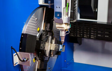 Pipe laser cutting machine. Industrial manufacture.