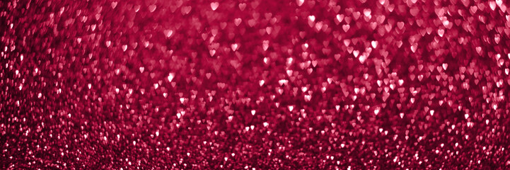 Trendy viva magenta, pink red hearts, sparkling glitter bokeh panoramic background banner,...