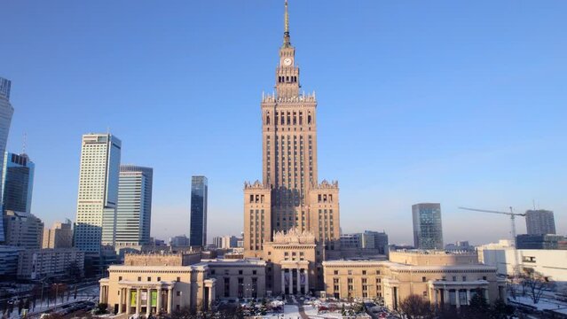 Winter aerial drone video of the business district of the city with skyscrapers in sunlight, Warsaw downtown, 4k