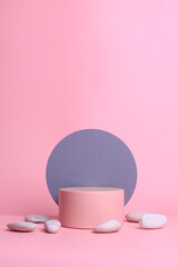 Pink round podium with circle gray geometry and white stone isolated on pink background. Exhibition and presentation for beauty products. 