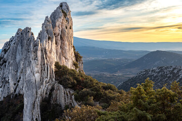 Aerial view of les Dentelles de Montmirail in front of the Mont Ventoux in the french alps - obrazy, fototapety, plakaty