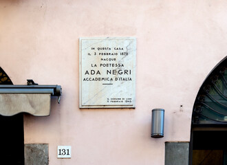 Commemorative plaque pointing the birthplace of Italian poet and teacher Ada Negri, in Lodi, Lombardy region, northern Italy