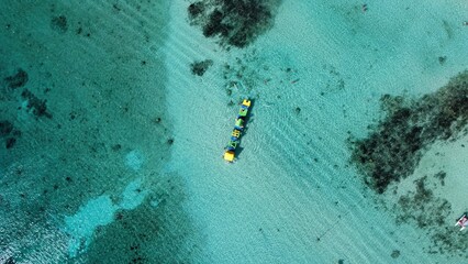 a drone flight over a caribbean island the coast from above dreamlike sea