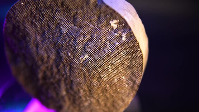 Used, destroyed, with deformation. Filter of harmful emissions, catalyst from the vehicle. detail close up view. Material containing precious metals. Muffler of the exhaust system. 
