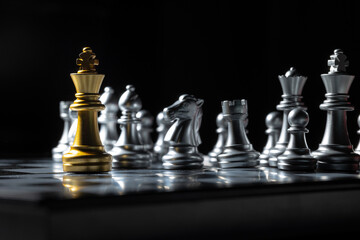 The chess king on the board is fighting with the opponent. business concept success concept
