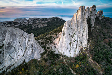 Aerial view of les Dentelles de Montmirail in front of the Mont Ventoux in the french alps