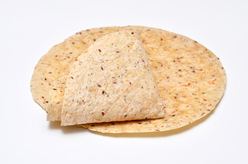 whole grain latin tortillas on a white background close-up