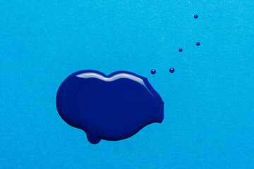 spot of blue enamel on a light blue background