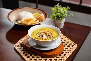 Soto ayam is a typical Indonesian food in the form of a kind of chicken soup with a yellowish sauce.