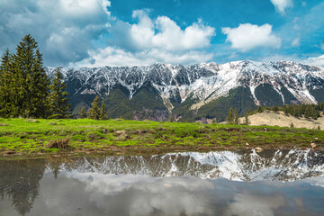 Piatra Craiului mountains view from the small lake, Carpathians, Romania