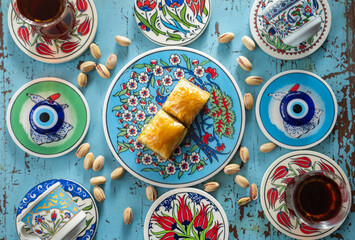 Photograph of Turkish Baklava in Ottoman Tile Turkish Coffee Cup and Turkish Tea Concept, Uskudar...