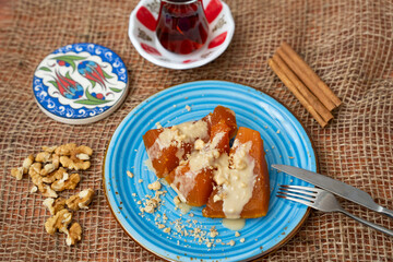 Traditional Turkish Pumpkin Dessert (Balkabagi Tatlisi)with Tahini and Walnuts Photo, Uskudar Istanbul, Turkey
