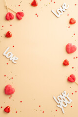 Valentine's Day concept. Top view vertical photo of heart shaped lollipops chocolate candies...