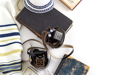 Tallit and tefillin and jewish Kippah yarmulke (hat)  on white background