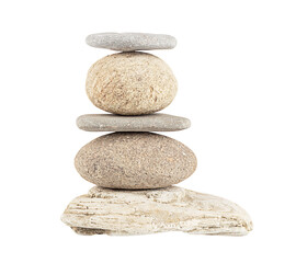Fototapeta na wymiar Balancing pyramid of five sea stones, front view. Harmony, balance, spa therapy, zen concept.
