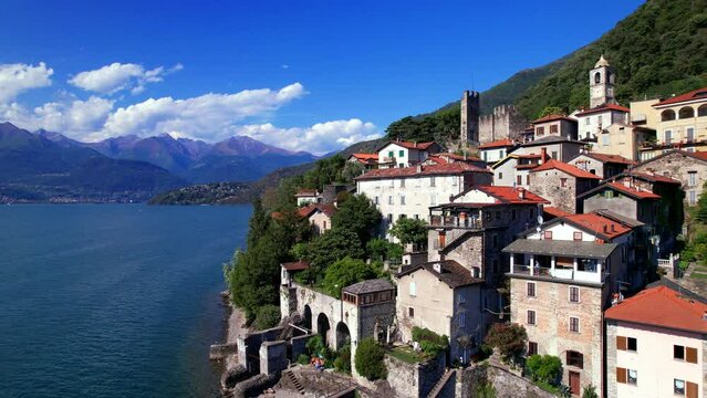 One of the most beautiful lakes of Italy - Lago di Como scenery. aerial drone video of beautiful medieval village Dervio

