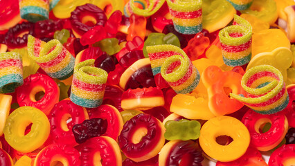 Fototapeta na wymiar Assorted colorful gummy candies. Top view. Jelly donuts.