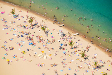 Oak Street beach with Lake Michigan, aerial view, people enjoying the sunny summer day outdoors, Chicago, Illinois, USA.