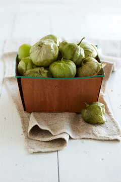 Green Tomatillos in Basket