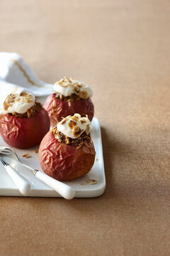 Baked Red Apples Stuffed with Oatmeal, Granola and Yogurt, Studio Shot