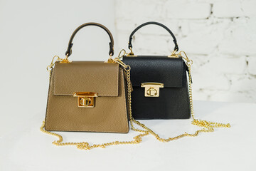 Women's leather cocktail bags on metal chains. Fashionable small women's bags