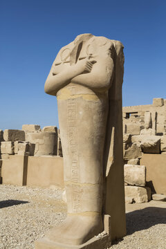 Statue of headless Pharaoh with Anks, Karnak Temple Complex, UNESCO World Heritage Site; Luxor, Egypt