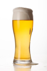 Glass of light beer isolated