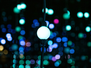  colored lights in a dark room