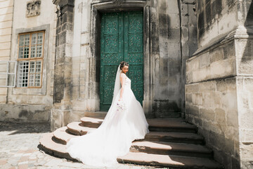 Beautiful luxury bride in elegant white dress
